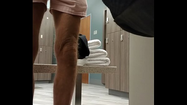 Changing into yoga clothes in the locker room.