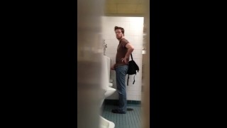 College Guy flashing and stroking meaty cock at urinal