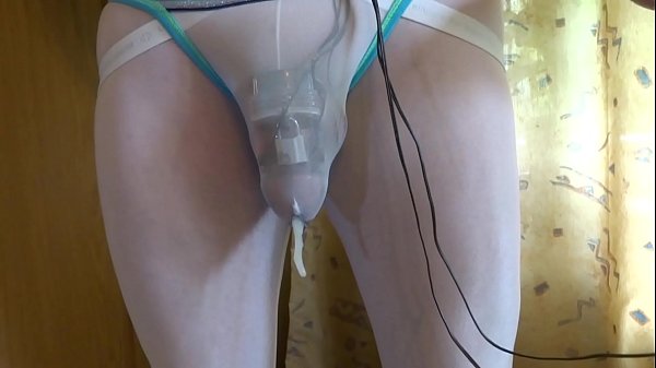 Cumming with e-stim and chastity cage through panties
