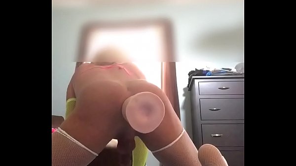 crossdresser riding a few huge toys