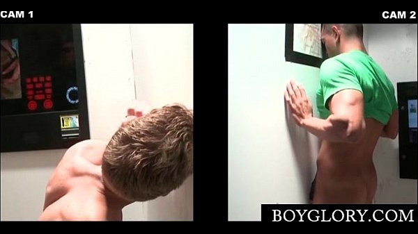 Slim blonde gay sucks dick on knees on gloryhole