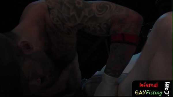 Hot inked hunk sucking on cock and balls