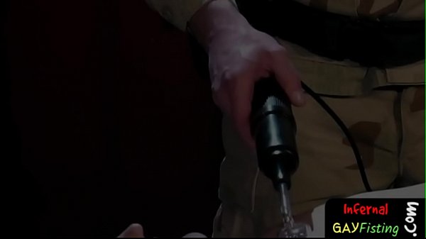 Restrained submissive toyed and fisted